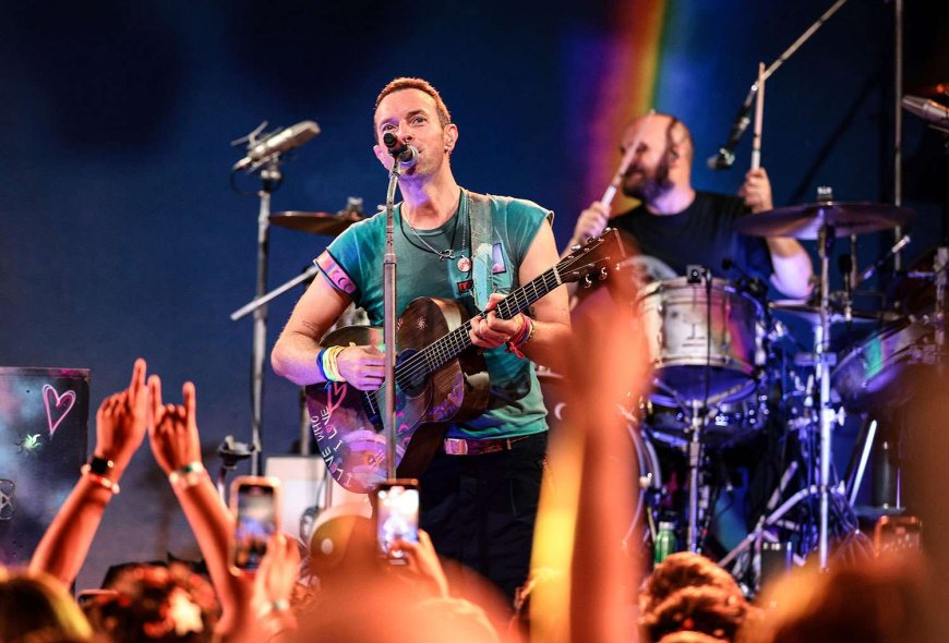 Chris Martin Falls in Stage Trap Door While Performing with Coldplay in Australia