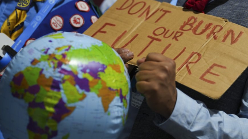 At climate summit in Baku, negotiators are urged to get down to business as talks enter second week