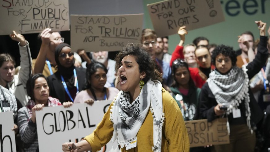 Negotiators work through the night at UN climate talks to try to reach a cash deal for poor nations