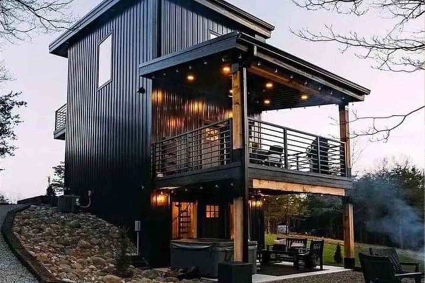 This Two-Story Tiny Home on Amazon Has a Fireplace, Wall-to-Wall Windows, a Patio, and a Deck