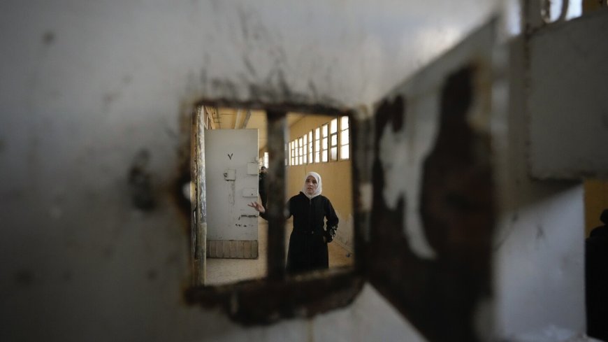 Thousands scour Syria's most horrific prison but find no sign of their loved ones