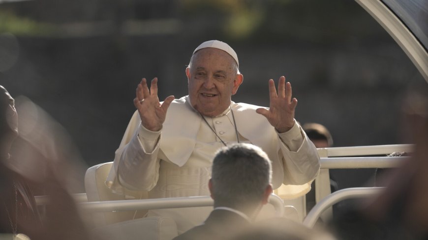 Pope Francis makes 1st papal visit to France's Corsica awash in expressions of popular piety