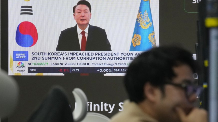 South Korean authorities seek warrant to detain impeached President Yoon in martial law probe