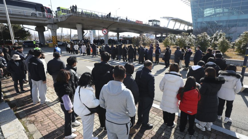 South Korea air crash investigators extract black box data as grieving families mourn the victims